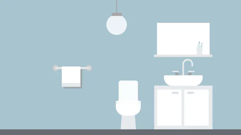 Badezimmer mit Toilette, Waschbecken und Spiegel
